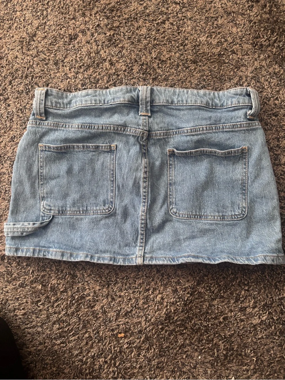 Washed Light Blue Denim Mini Skirt with Front Patch Pockets